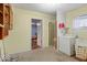 Practical laundry room with washer, dryer, and storage space, offering convenience at 3737 Forest Ter, Anderson, IN 46013