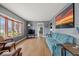 Comfortable living room showcasing hardwood floors, natural light, and ample space for relaxation and entertainment at 3737 Forest Ter, Anderson, IN 46013