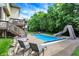 Gorgeous backyard featuring a swimming pool with a slide and plenty of space for outdoor activities at 3940 Woodcrest Ct, Westfield, IN 46062
