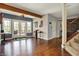 Finished basement area featuring walkout french doors, bar stools, and a staircase at 3940 Woodcrest Ct, Westfield, IN 46062