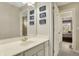 Well-lit bathroom with a single vanity and stylish wall decor at 3940 Woodcrest Ct, Westfield, IN 46062