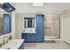 Well-appointed bathroom with custom vanities, a walk-in shower, and tile flooring at 3940 Woodcrest Ct, Westfield, IN 46062