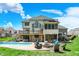 Large home with multiple decks, backyard pool, stone patio, outdoor fire pit, and landscaped yard at 3940 Woodcrest Ct, Westfield, IN 46062