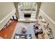 Aerial view of a large living room with plush seating, large windows, and a cozy atmosphere at 3940 Woodcrest Ct, Westfield, IN 46062