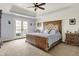Bright bedroom with white shiplap walls and French doors at 3940 Woodcrest Ct, Westfield, IN 46062