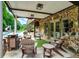 Inviting outdoor patio with comfortable seating and a view of the pool at 3940 Woodcrest Ct, Westfield, IN 46062