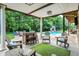 Outdoor patio with comfortable seating and a view of the pool and backyard at 3940 Woodcrest Ct, Westfield, IN 46062