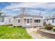 Charming single-story home with a well-maintained lawn and welcoming entrance at 4203 Main St, Anderson, IN 46013