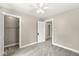 A bedroom featuring a fan and two closets at 4575 N Guilford Ave, Indianapolis, IN 46205