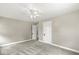An empty bedroom with carpet, neutral paint, and natural light at 4575 N Guilford Ave, Indianapolis, IN 46205