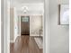 Inviting foyer with hardwood floors and a view of the front door at 4575 N Guilford Ave, Indianapolis, IN 46205