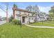 View of a well maintained home with a green lawn and sidewalk at 4575 N Guilford Ave, Indianapolis, IN 46205