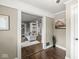 Open-concept living room with hardwood floors and neutral decor at 4575 N Guilford Ave, Indianapolis, IN 46205