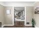 Cozy living room with a view of the staircase and neutral colored decor at 4575 N Guilford Ave, Indianapolis, IN 46205