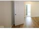 Bright bedroom featuring light wood flooring and an open doorway to another room at 5052 Carmine St, Brownsburg, IN 46112