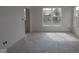 Sun-filled bedroom with big window overlooking the yard at 5052 Carmine St, Brownsburg, IN 46112