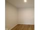 Empty room with wood flooring and neutral walls, ready for customization at 5052 Carmine St, Brownsburg, IN 46112