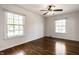 Bedroom with hardwood floors and sun-filled windows at 5130 N Washington Blvd, Indianapolis, IN 46205