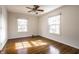 Spacious bedroom with hardwood floors and ample natural light at 5130 N Washington Blvd, Indianapolis, IN 46205