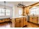 Lovely kitchen with stainless appliances and island with seating at 5130 N Washington Blvd, Indianapolis, IN 46205