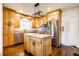 Modern kitchen features stainless appliances and center island at 5130 N Washington Blvd, Indianapolis, IN 46205