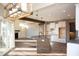 Open-concept kitchen featuring a center island, sleek countertops, and a view of the living area at 5179 Oak Ridge Trl, Columbus, IN 47201
