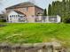 Lush backyard featuring a white fence, ideal for privacy and relaxation at 5773 Station Hill Dr, Avon, IN 46123