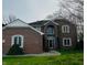 Charming brick home featuring classic architectural details and a well-maintained lawn at 5773 Station Hill Dr, Avon, IN 46123