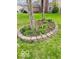 Landscaped garden bed with blooming flowers and healthy green plants, adding charm to the property's exterior at 5773 Station Hill Dr, Avon, IN 46123