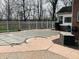 A fenced in inground pool awaits summer fun and relaxation, with ample patio space for lounging and entertaining at 5773 Station Hill Dr, Avon, IN 46123