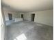 Large, unfinished living area is ready for customization with lots of bright, natural light at 5924 Trichel Dr, Greenwood, IN 46143