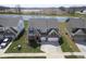 Elevated view showcasing a two-story home with a well-manicured lawn and proximity to community amenities at 613 Waterford Ln, Westfield, IN 46074
