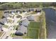 Aerial view of the home showcasing the property line, spacious backyard, and neighborhood layout near the lake at 613 Waterford Ln, Westfield, IN 46074