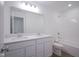 Bright bathroom with double vanity, quartz countertop, and tub/shower combo at 613 Waterford Ln, Westfield, IN 46074