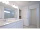 Modern bathroom with dual sinks, walk-in shower, and walk-in closet at 613 Waterford Ln, Westfield, IN 46074