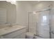 Modern bathroom features a vanity and glass-door shower at 613 Waterford Ln, Westfield, IN 46074