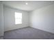 Neutral bedroom featuring natural light and clean white trim at 613 Waterford Ln, Westfield, IN 46074