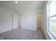 Neutral bedroom with plush carpet, closet and large windows at 613 Waterford Ln, Westfield, IN 46074