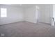 Large upstairs bedroom with closet and neutral carpet at 613 Waterford Ln, Westfield, IN 46074