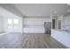 Open-concept kitchen featuring stainless steel appliances and ample cabinet space at 613 Waterford Ln, Westfield, IN 46074