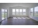 Sun-filled living area with large windows providing beautiful nature views at 613 Waterford Ln, Westfield, IN 46074