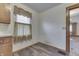 Cozy kitchen nook with a window and laminate flooring at 620 S Irvington Ave, Indianapolis, IN 46219
