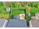 Aerial view of a fenced backyard with a deck, pergola, shed, and play set at 6650 W Black Tail Way, McCordsville, IN 46055