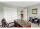 Study or bedroom features mint walls, an closet, and a wooden desk at 6650 W Black Tail Way, McCordsville, IN 46055