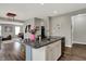 Spacious kitchen with a large island and granite countertops, offering ample workspace at 6650 W Black Tail Way, McCordsville, IN 46055