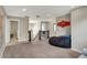 Open landing area with staircase at 6650 W Black Tail Way, McCordsville, IN 46055