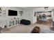 Comfortable living area with sleek decor, open to the modern kitchen and dining spaces at 6650 W Black Tail Way, McCordsville, IN 46055