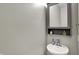 Neat powder room features a modern vanity and mirror at 6650 W Black Tail Way, McCordsville, IN 46055