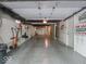 Unfinished basement offering potential for storage and organization with a for sale sign at 7037 Indian Lake W Blvd, Indianapolis, IN 46236