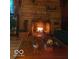 Cozy stone fireplace provides warmth and ambiance in the living room at 7037 Indian Lake W Blvd, Indianapolis, IN 46236
